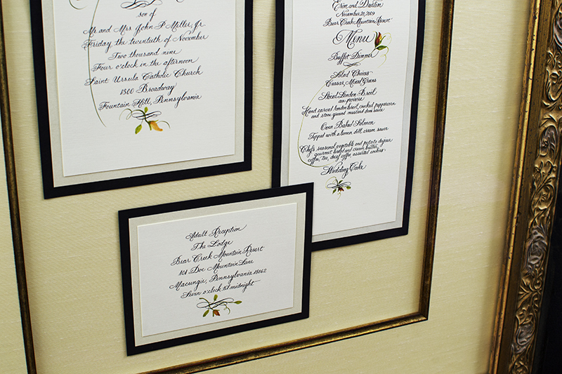 detail of framed wedding invite